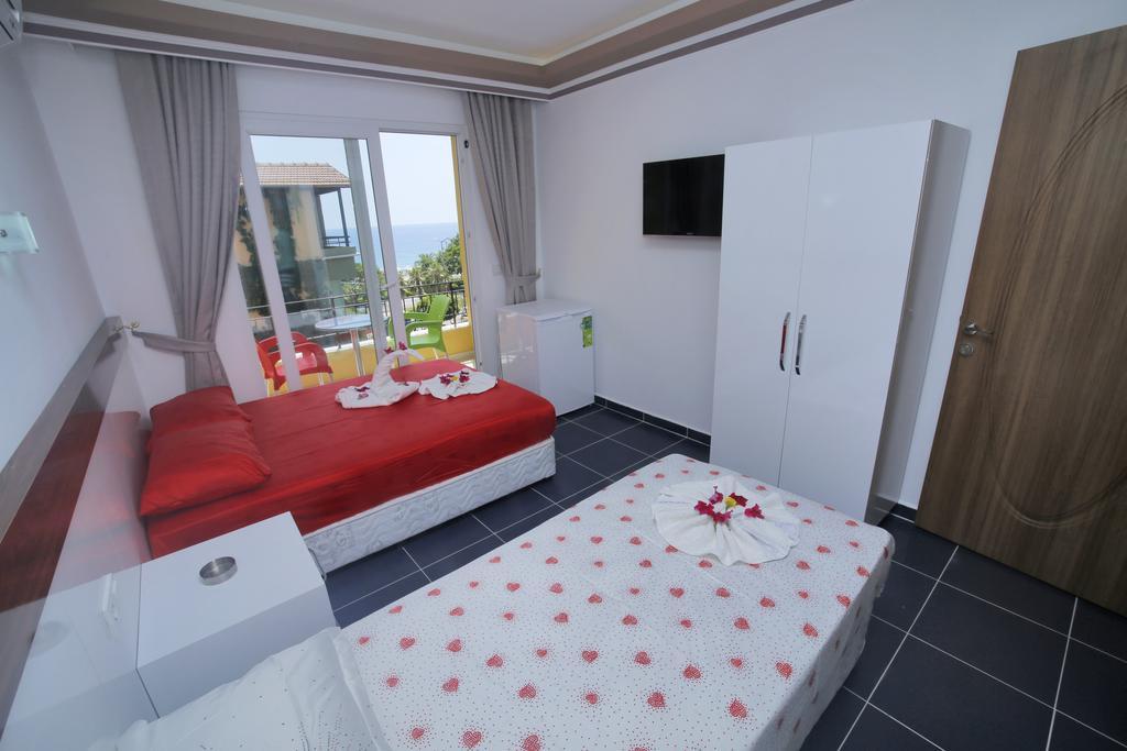 Ustun Apart Pansiyon Alanya Rum bild