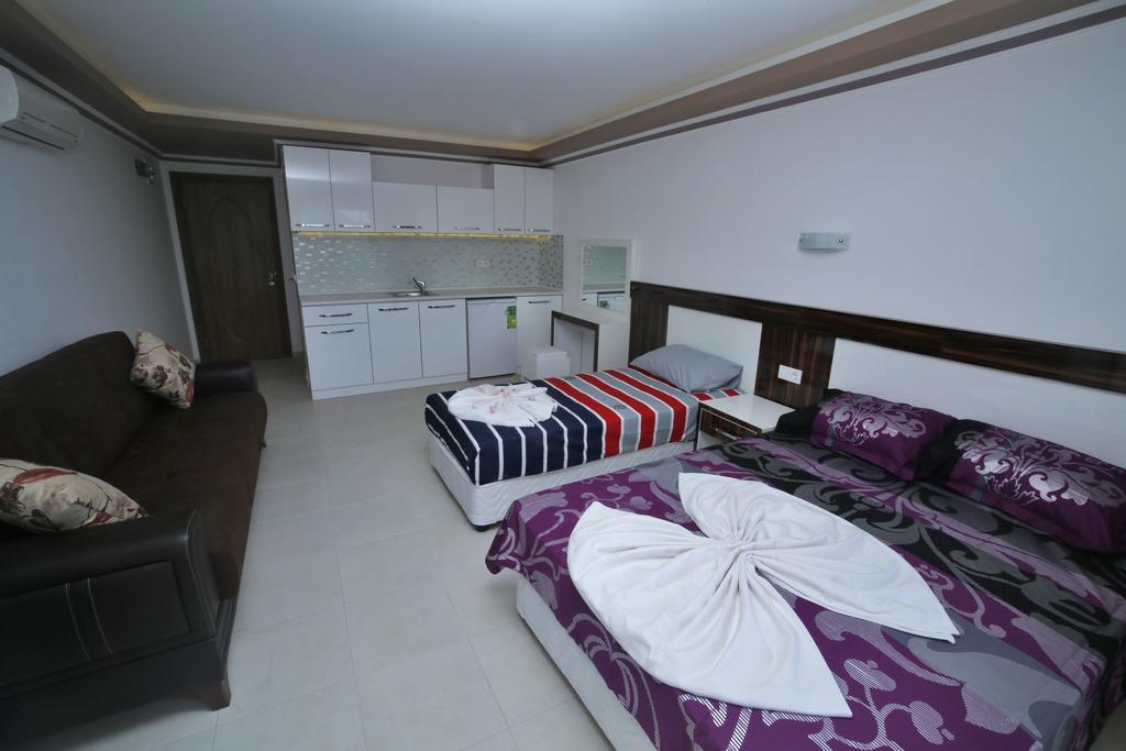 Ustun Apart Pansiyon Alanya Rum bild