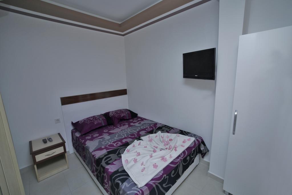 Ustun Apart Pansiyon Alanya Rum bild